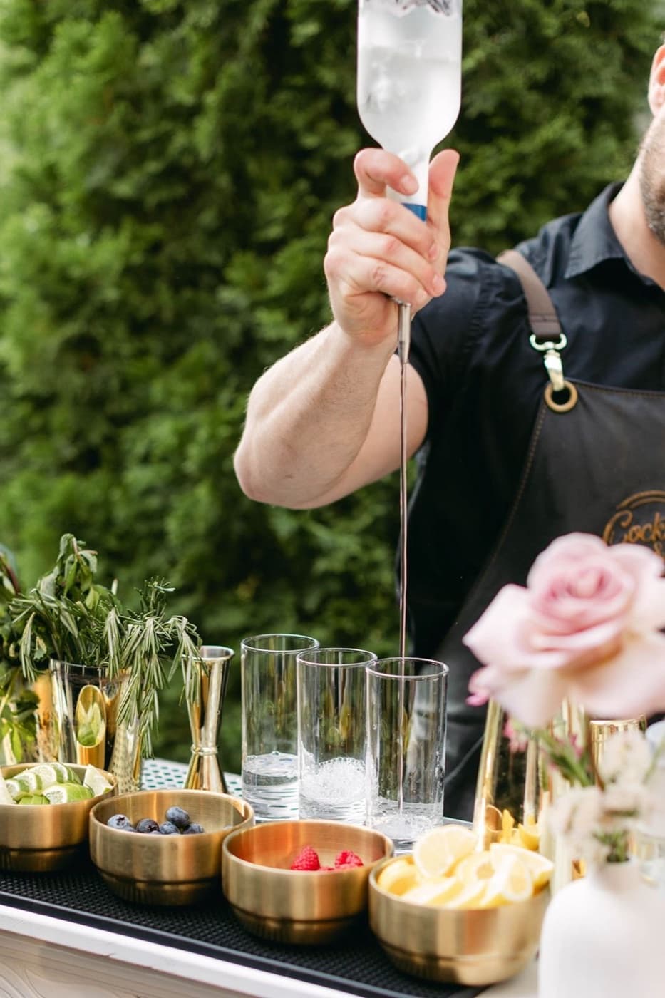 Mobile bar — bartender at brass bar